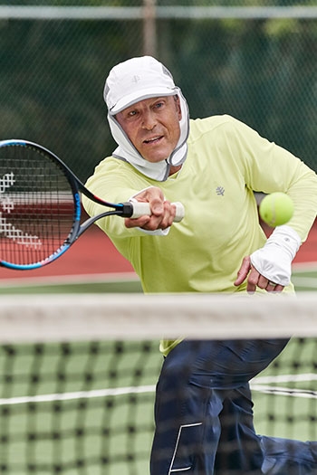 Mens Active - man playing tennis