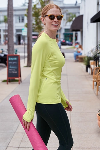Womens Active - Woman walking with yoga mat
